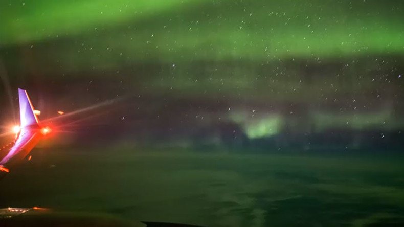 Ethereal Northern Lights captured from 35,000ft by airplane passenger (VIDEO)