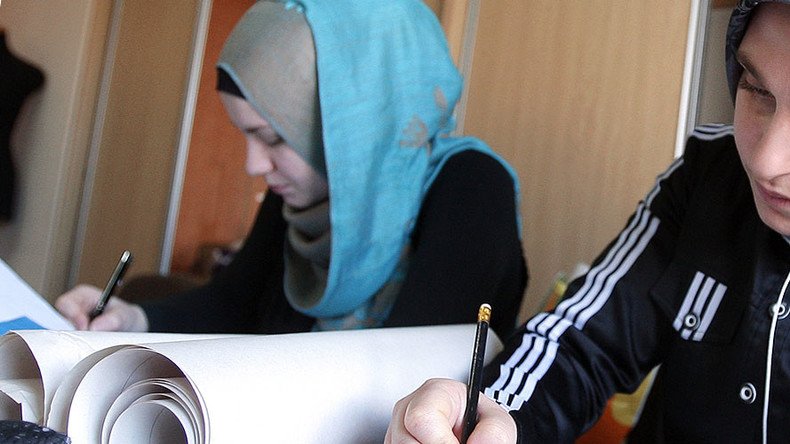 Russian opinions split equally over school hijab ban, poll shows