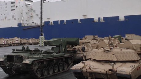100s more US tanks & military hardware arrive in Europe to keep ‘peace & freedom’ at Russian borders