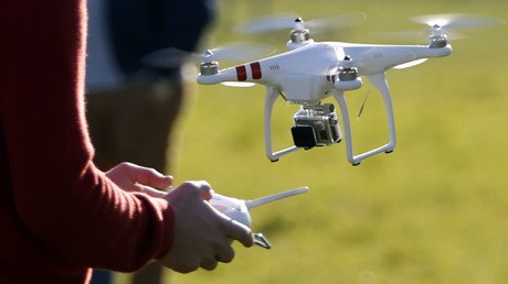 Close call: Passenger plane & drone narrowly avoid collision over UK school