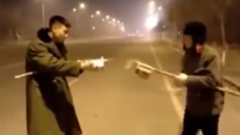 Sparks fly as fireworks fight erupts on street in explosive video