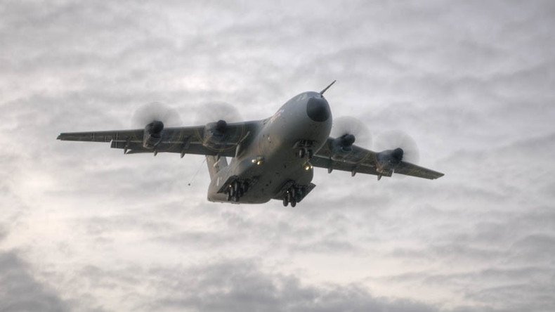 Rock blocked: Gibraltar police car speeds onto runway to stop RAF plane from taking off