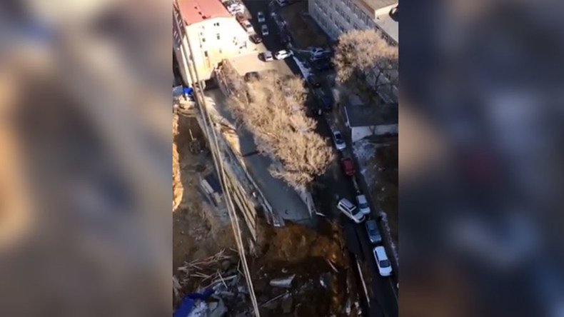 Huge sinkhole swallows part of road in Vladivostok, Russia (AERIAL VIDEO)