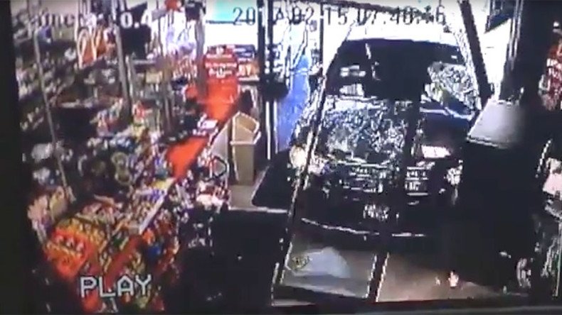 Driverless SUV smashes through shop entrance, knocks down child (VIDEO)