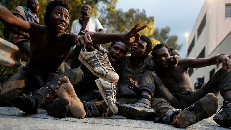 ‘Freedom! Victory!’ 500 African migrants celebrate after breaking through EU border fence (VIDEO)
