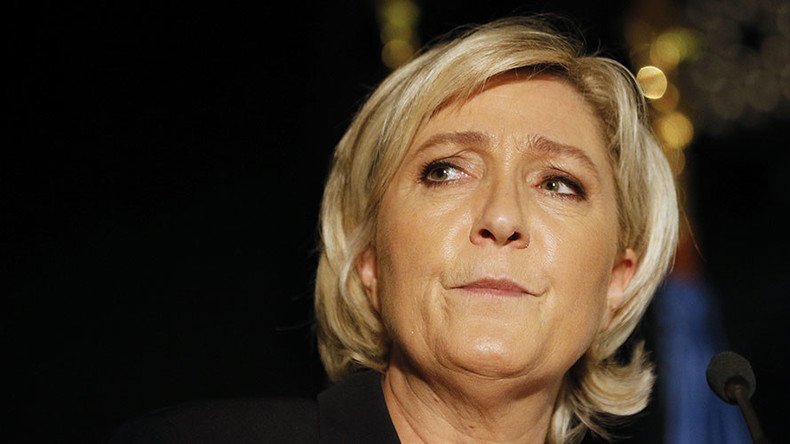 Police search Le Pen’s National Front HQ over alleged misuse of EU funds 