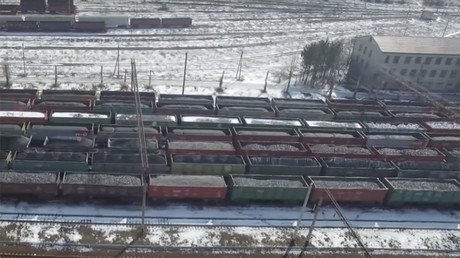 Drone captures endless lines of coal cars held up by blockade of rebel E. Ukraine (VIDEO)