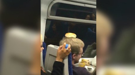 Mass drunken brawl on British train sparked by bagel (VIDEO)