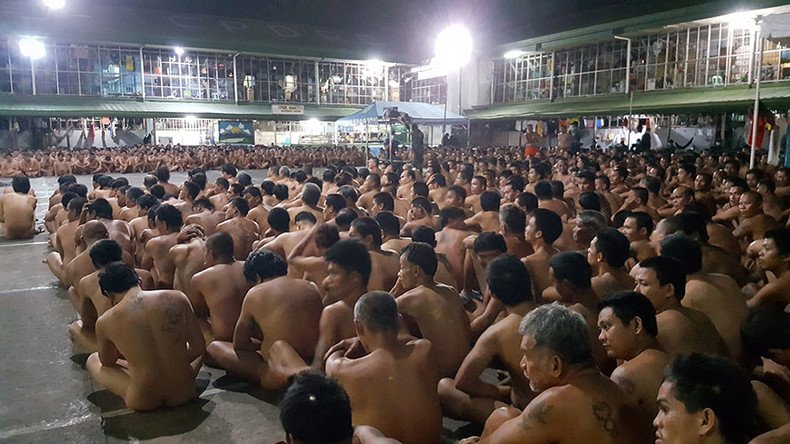 Images of Philippines prisoners sitting naked in contraband raid spark outrage (PHOTOS)