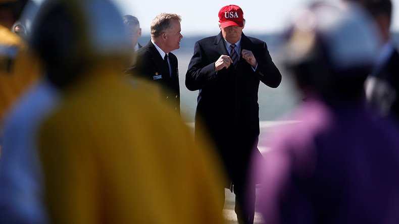 Trump promotes military buildup aboard next-gen aircraft carrier