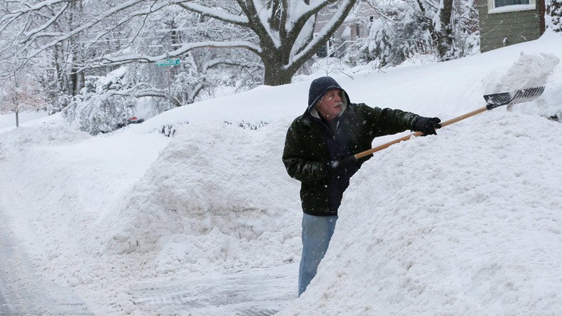 Nearly 100,000 without power as snow, sleet & strong winds lash Northeast