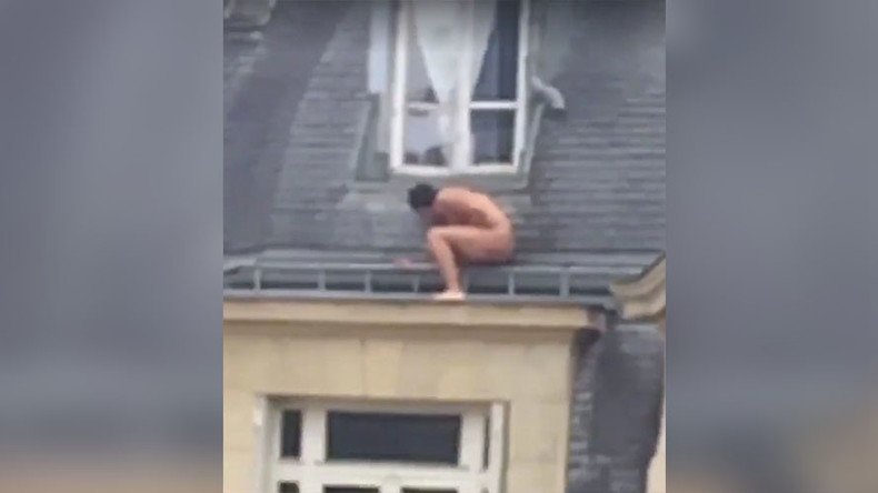 Nude man perched on apartment ledge baffles internet (VIDEO, POLL)