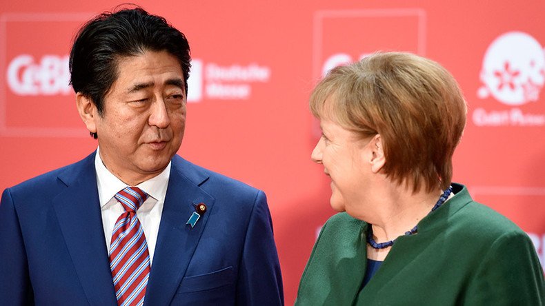 Merkel, Abe defend globalization, calling for EU-Japan trade agreement