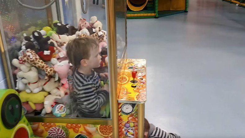 Game over! Toddler gets trapped inside toy-claw arcade machine (VIDEO)
