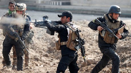 Iraqi troops recapture key govt building in Mosul amidst exodus