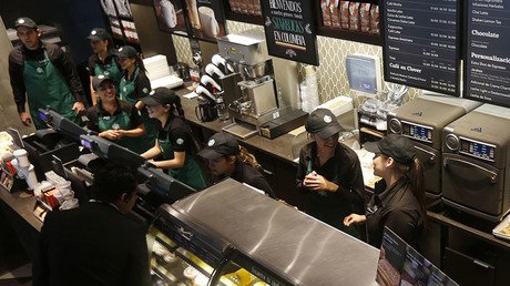 Starbucks apologizes for coffee shop arrest of two black men (VIDEO)