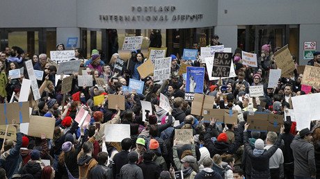 Trump has authority to issue revised travel ban, Virginia judge rules