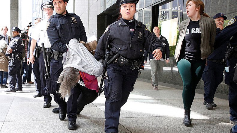 ‘No raids, no bans, no wall’ yell protesters arrested after staging sit-in Trump Tower
