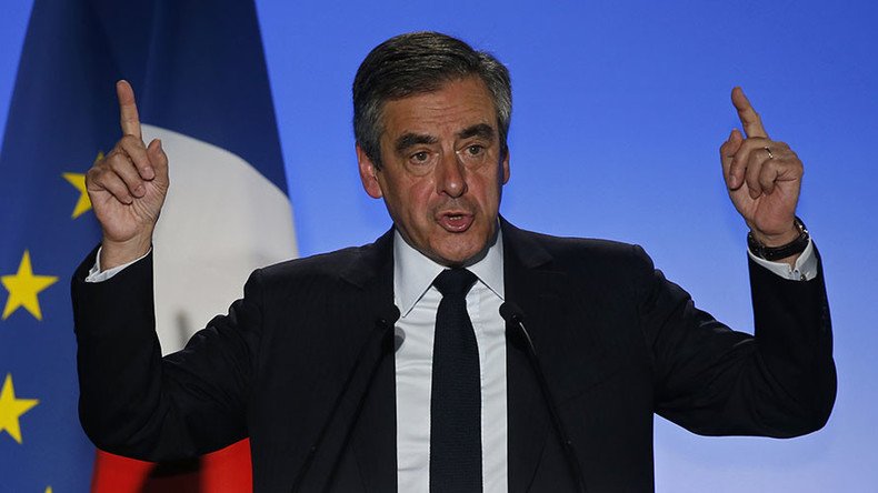 French presidential hopeful Fillon calls for suspension of campaign activities after Paris shooting