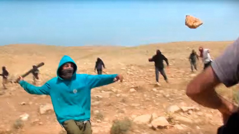  Masked Israeli settlers assault Jewish-Arab activists with stones, sticks (VIDEO)