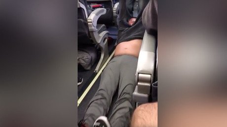 Police forcibly remove passenger at behest of United Airlines in disturbing footage