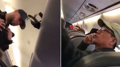 New United Airlines footage shows heated exchange before passenger dragged off plane (VIDEO)