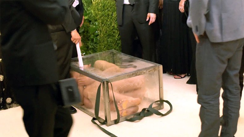 Rude nude? Naked Russian artist arrested after crashing Met Gala squashed in glass box (VIDEO)