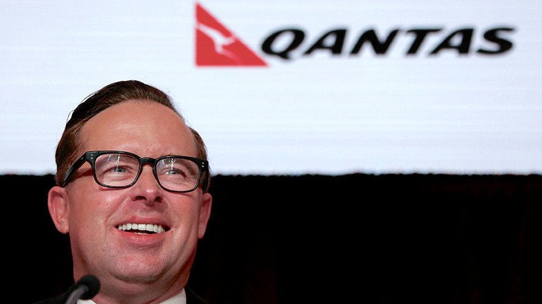 Qantas CEO gets smashed in face with massive cream pie (VIDEO)