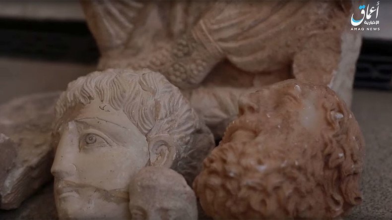 ISIS destroys ancient artefacts as campaign against Syrian heritage sites continues (VIDEO)