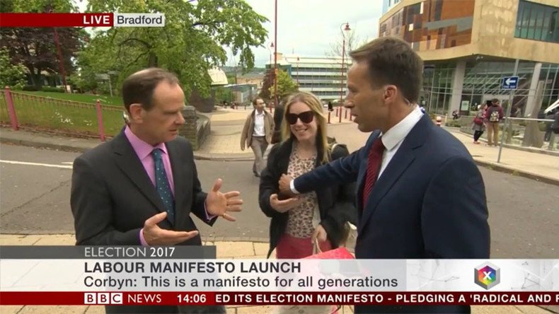 BBC reporter slapped after accidentally groping woman who interrupted live interview (VIDEO)