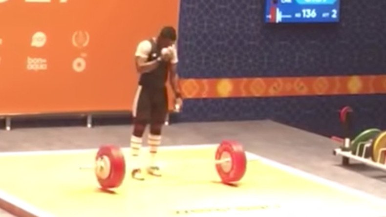 Nothing to get cross about: Cameroon weightlifter makes Christian sign at Islamic Games (VIDEO)