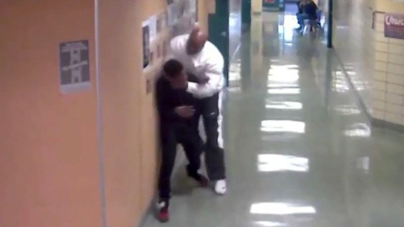 School behavioral specialist lifts teenage student by the neck (VIDEO)