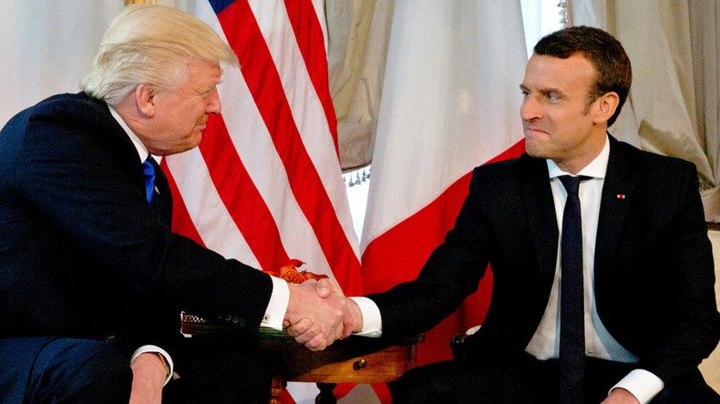 Trump & Macron engage in fierce handshake battle during first meeting (VIDEO)