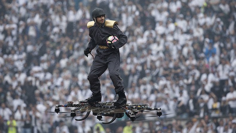 Man on drone delivers soccer ball to stadium in dramatic stunt (VIDEO)