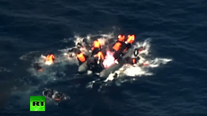 Horrifying moment migrant boat bursts into flames in the Med (VIDEO)