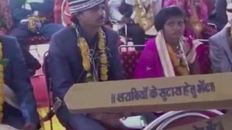 Indian minister arms 700 new brides with wooden bats against drunk & abusive husbands
