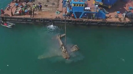 Drone captures lifting of US-made warplane that sank near Russia in WW2 (VIDEOS)