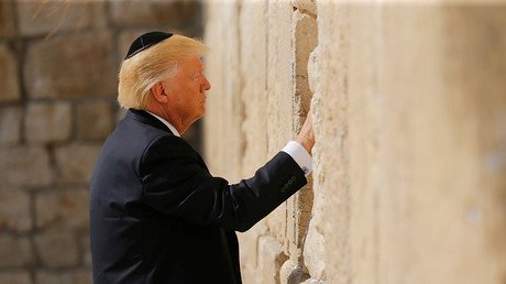 In 1st for US presidents, Trump prays at Western Wall in Jerusalem