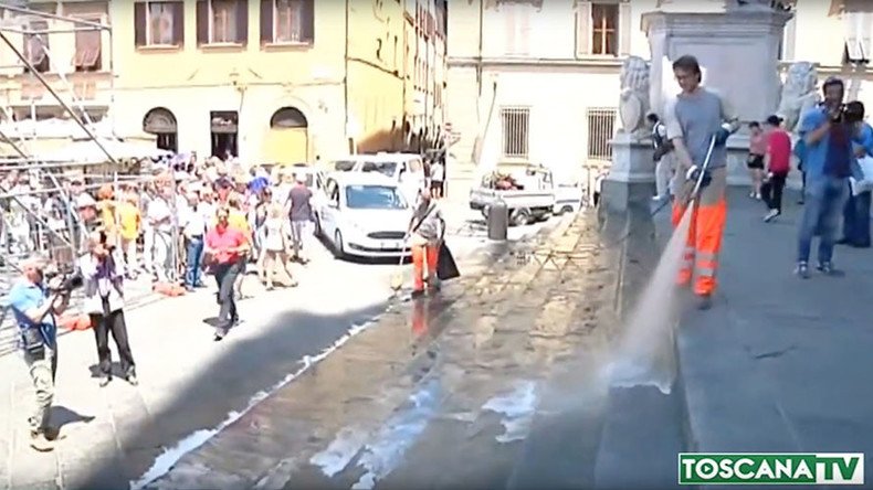 ‘Churches aren’t restaurants’: Florence hoses down cathedral steps to shoo snacking tourists