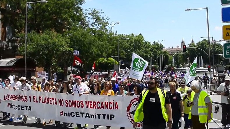 ‘CETA is against people’: Hundreds protest EU-Canada free trade deal in Madrid (VIDEO)