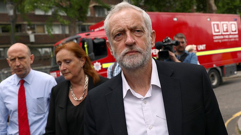 May & Corbyn visit site of London tower fire, but PM avoids talking to survivors
