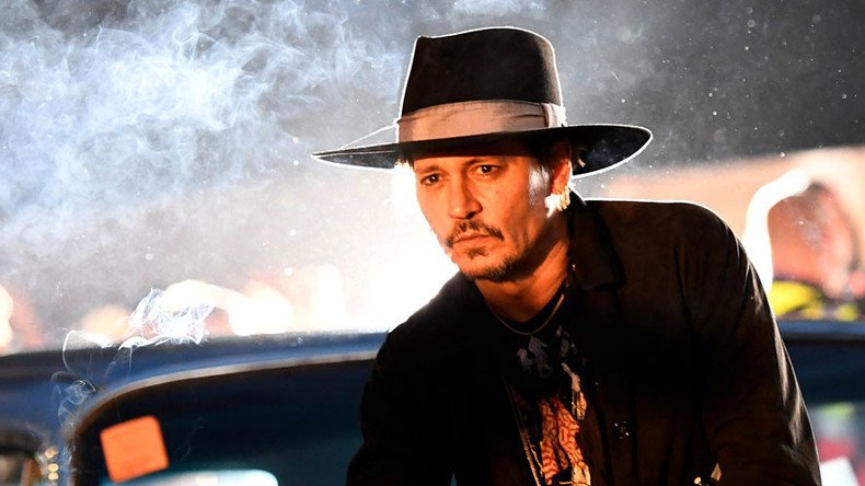 Johnny Depp plays the fool, jokes about Trump assassination