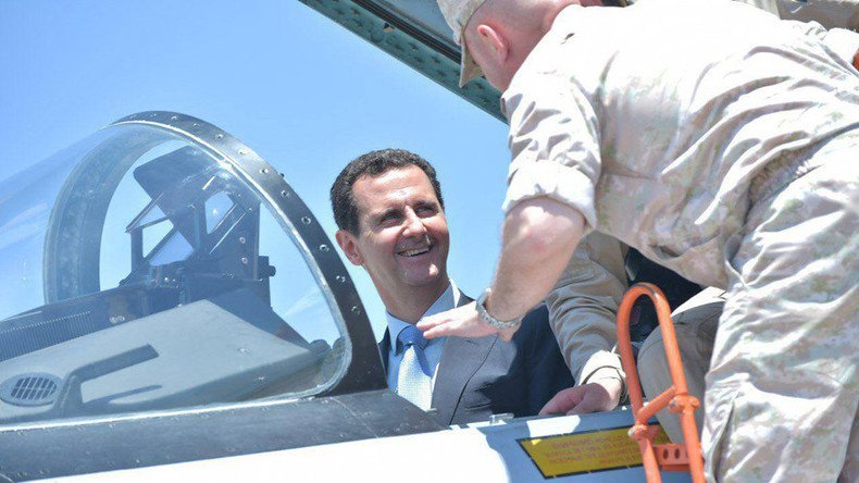 Syria’s Assad tries out role of Su-35 fighter jet pilot at Russia’s Khmeymim airbase (PHOTOS, VIDEO)