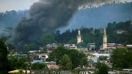 ISIS-linked militants storm school, take hostages in south Philippines village