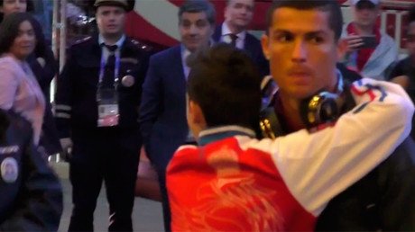 Young Ronaldo fan breaks through security to hug his hero (VIDEO)