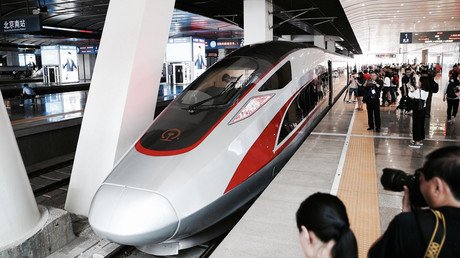 China unveils first domestically-built bullet train