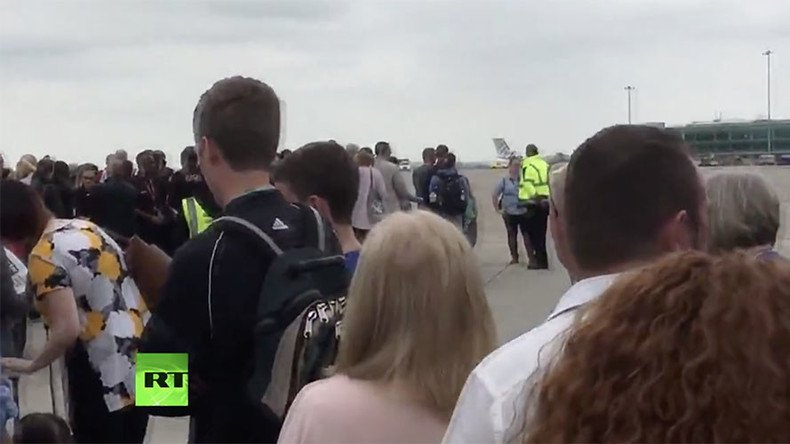 Bomb disposal police carry out controlled explosions at Manchester Airport 