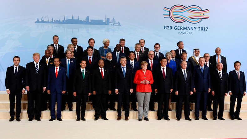 Not so close? Trump further from center than predecessor Obama for G20 family photo