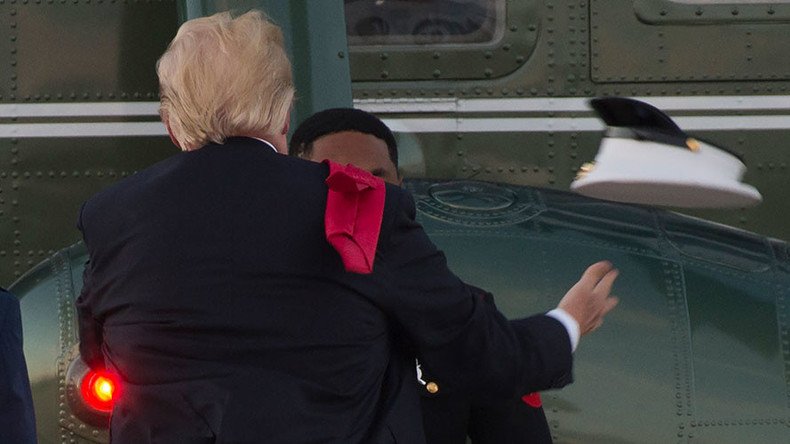 Trump struggles with Marine’s hat on windy helicopter pad (VIDEO)