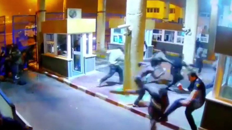 Spanish border guard suffers horrific leg break tackling migrant (VIDEO)